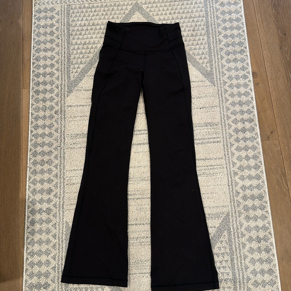 Lululemon size 6 wunder under yoga pants / flare leggings DISCONTINUED